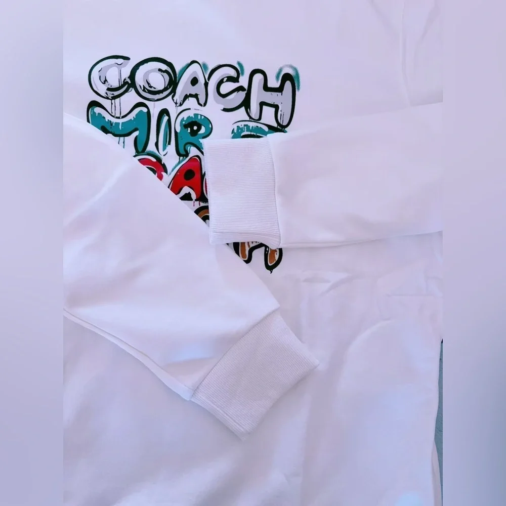 Coach women’s multi Sweatshirt‎ L